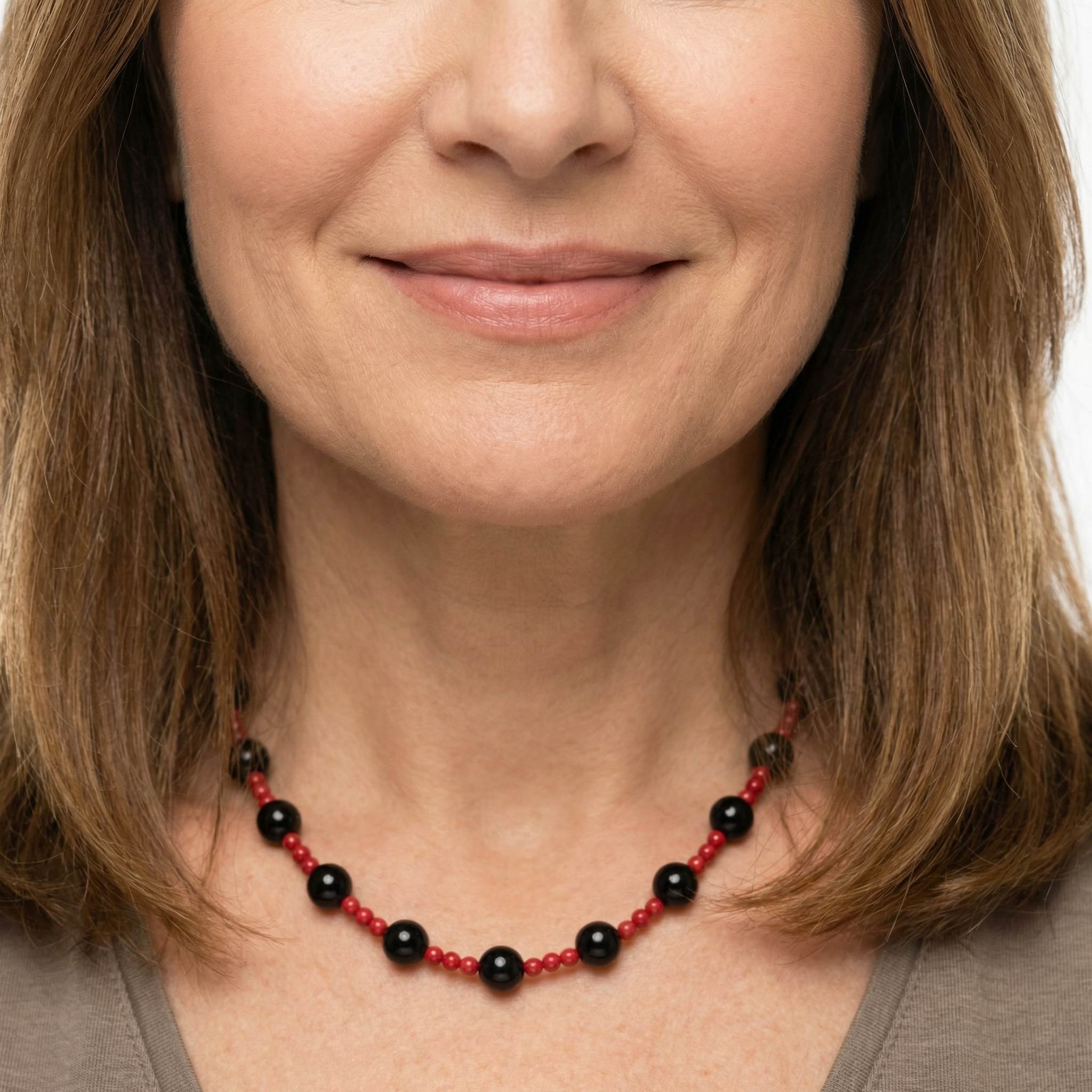 Korallenkette mit Onyx Kugeln